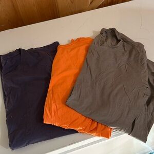 Lot of 3 Under Armour light long sleeve shirts. Size xl.